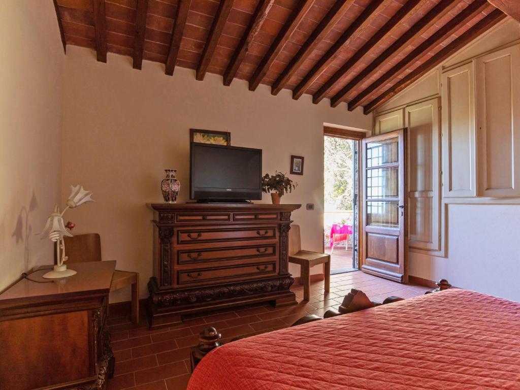 Televízia a/alebo spoločenská miestnosť v ubytovaní Villa Al Pozzo by Interhome