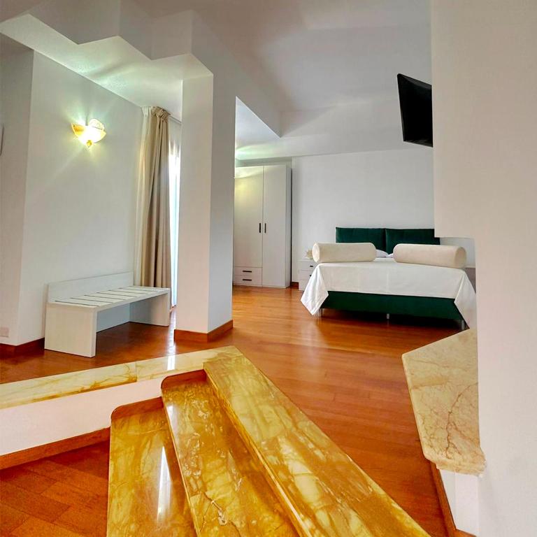 Postel nebo postele na pokoji v ubytování EliMar Villa & Pool