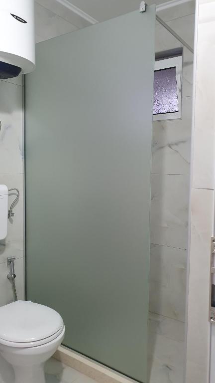 Koupelna v ubytování Guesthouse Sinani