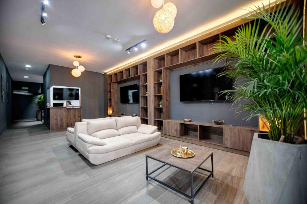 Posezení v ubytování Xliving Host and Rooms