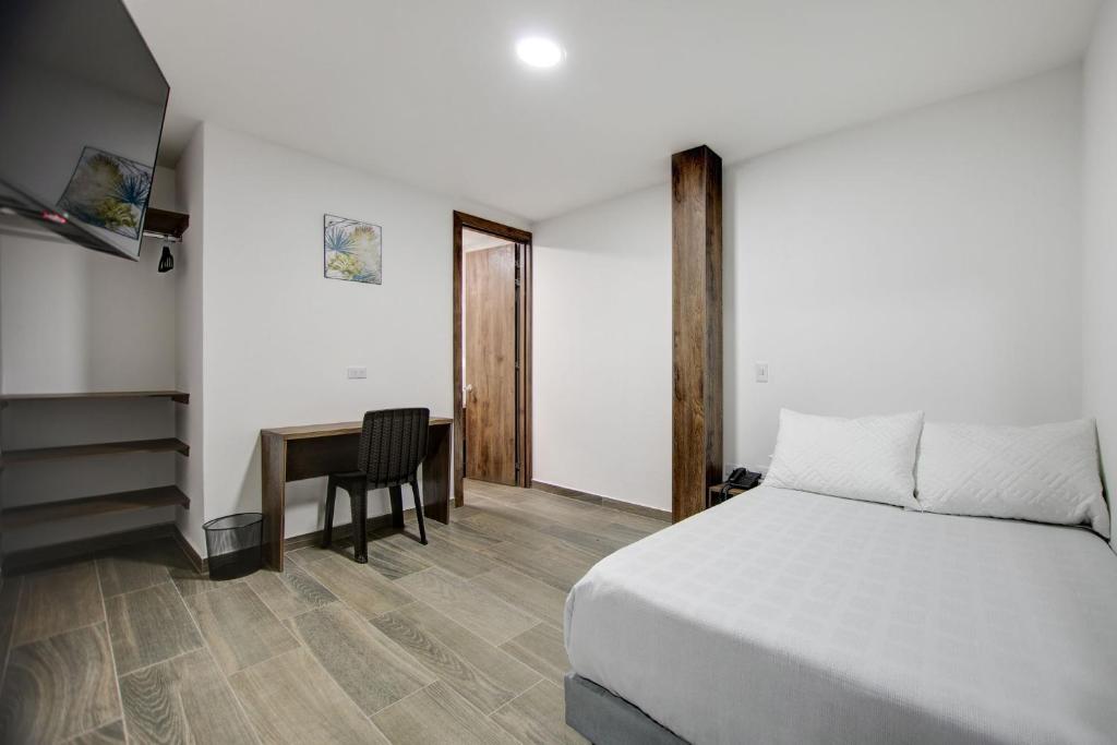 Postel nebo postele na pokoji v ubytování Xliving Host and Rooms