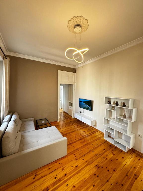 TV a/nebo společenská místnost v ubytování Gegekos Apartment
