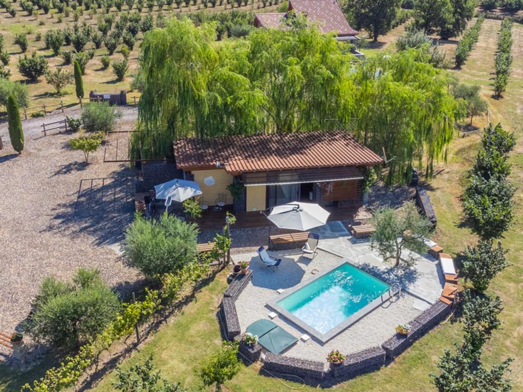 an aerial view of a house with a swimming pool at Chalet Il Vitigno by Interhome in Sutri