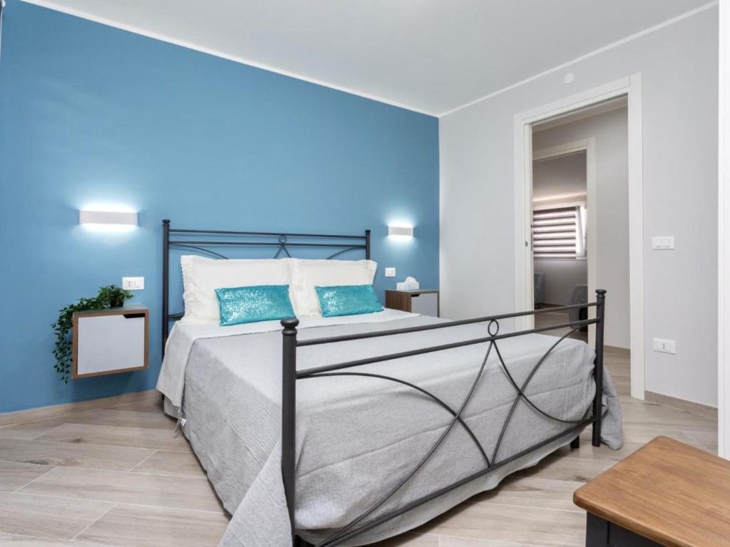 Łóżko lub łóżka w pokoju w obiekcie Villa Elena by Interhome