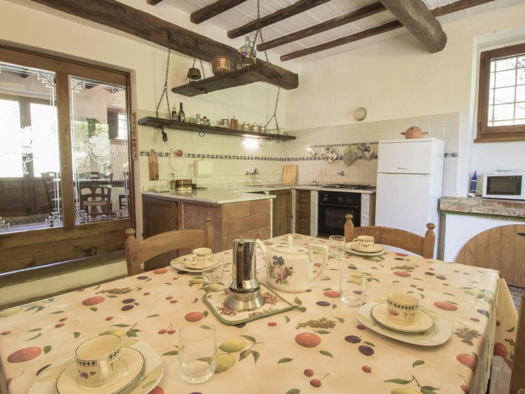 A kitchen or kitchenette at Holiday Home Casale Del Re by Interhome