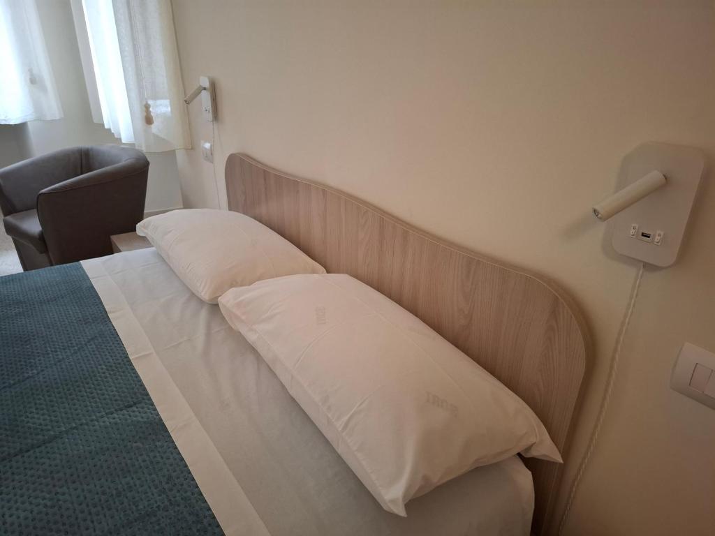 Letto o letti in una camera di Lupi e Agnelli