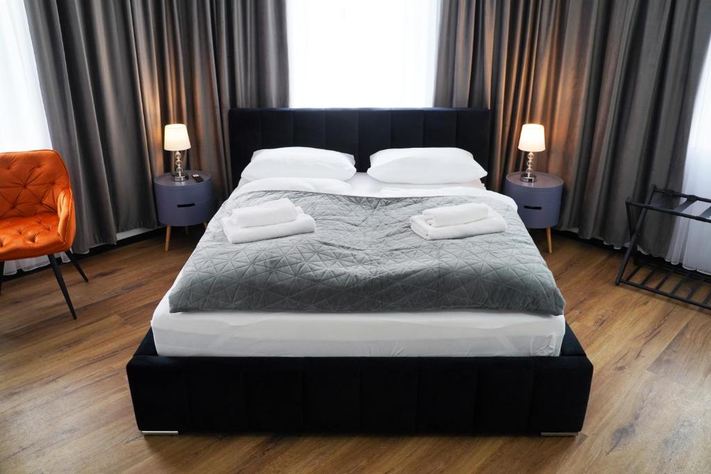 Postel nebo postele na pokoji v ubytování Hotel Elisei