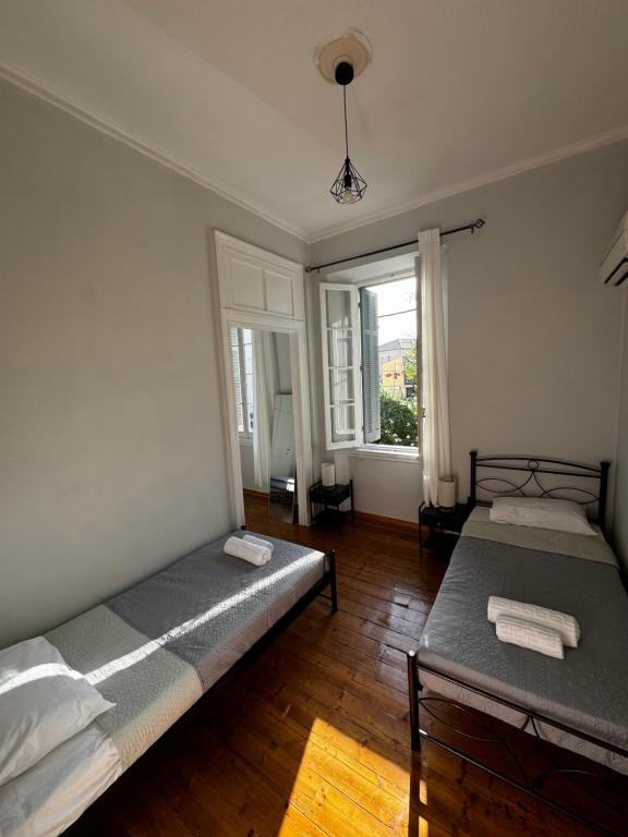 Postel nebo postele na pokoji v ubytování Gegekos Apartment