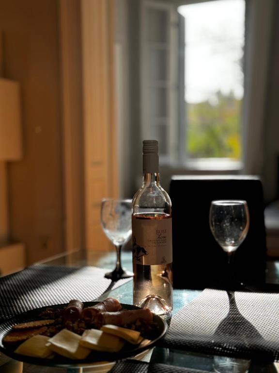 Nápoje v ubytování Gegekos Apartment