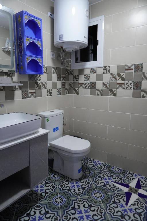 Salle de bains dans l'établissement RIAD CHENGLI 蓝城里