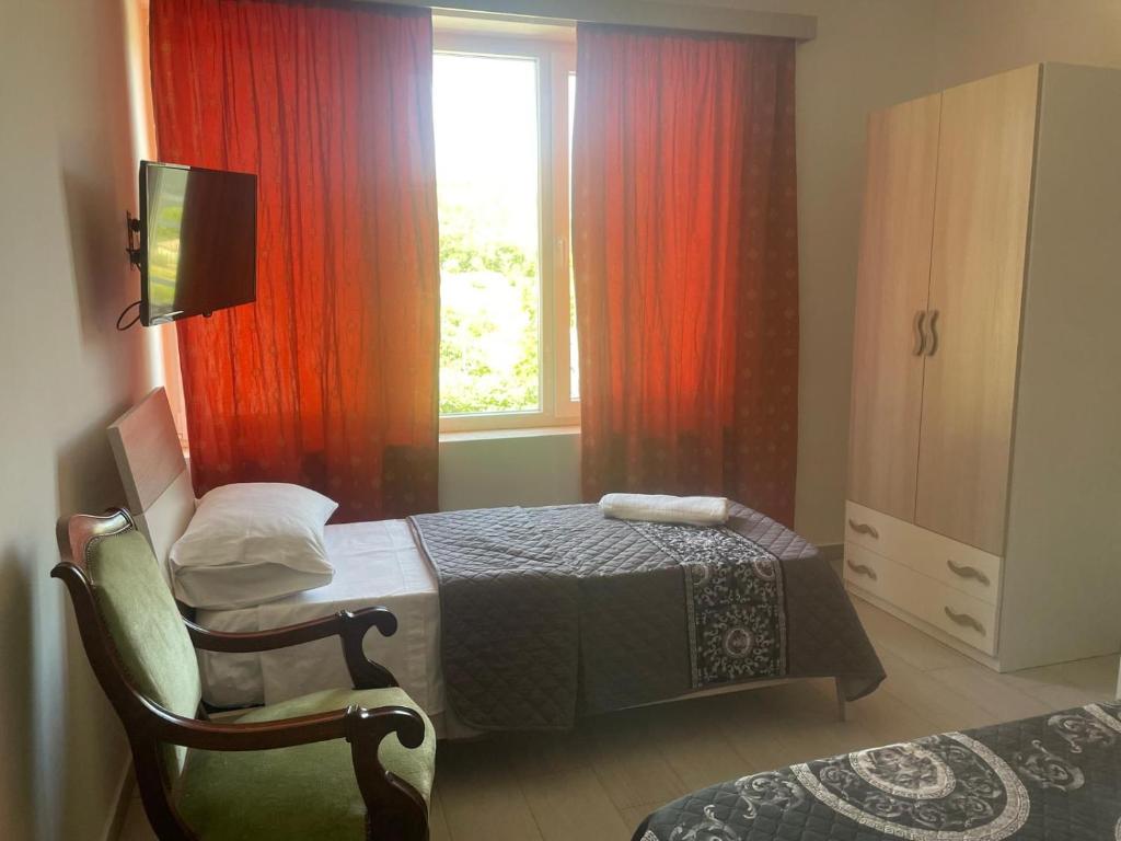 Postel nebo postele na pokoji v ubytování Villa Aurea