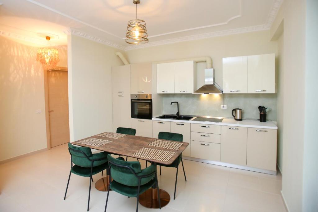 Kuchyň nebo kuchyňský kout v ubytování Oasis Residence