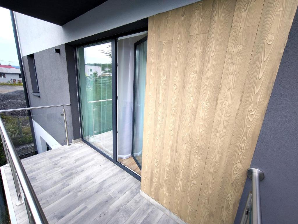 Balkón nebo terasa v ubytování Apartmány Karpatia s privátnym parkovaním