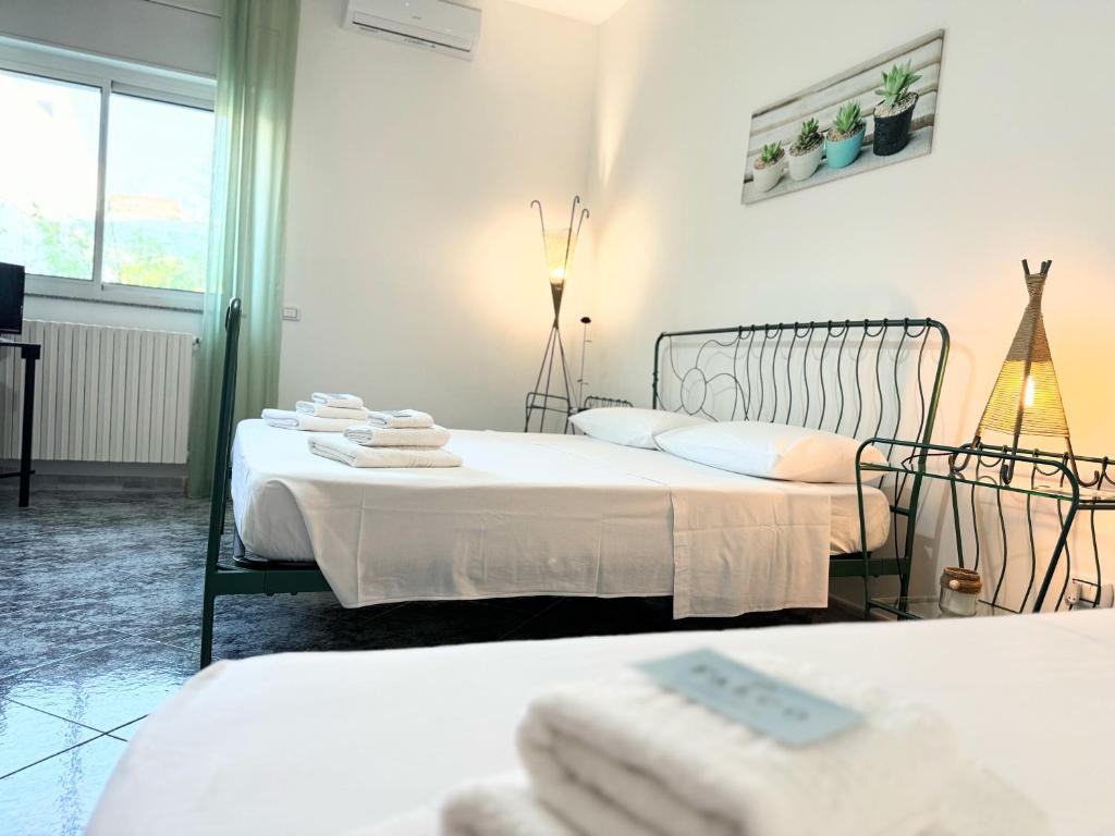 Postel nebo postele na pokoji v ubytování B&B Civico 42