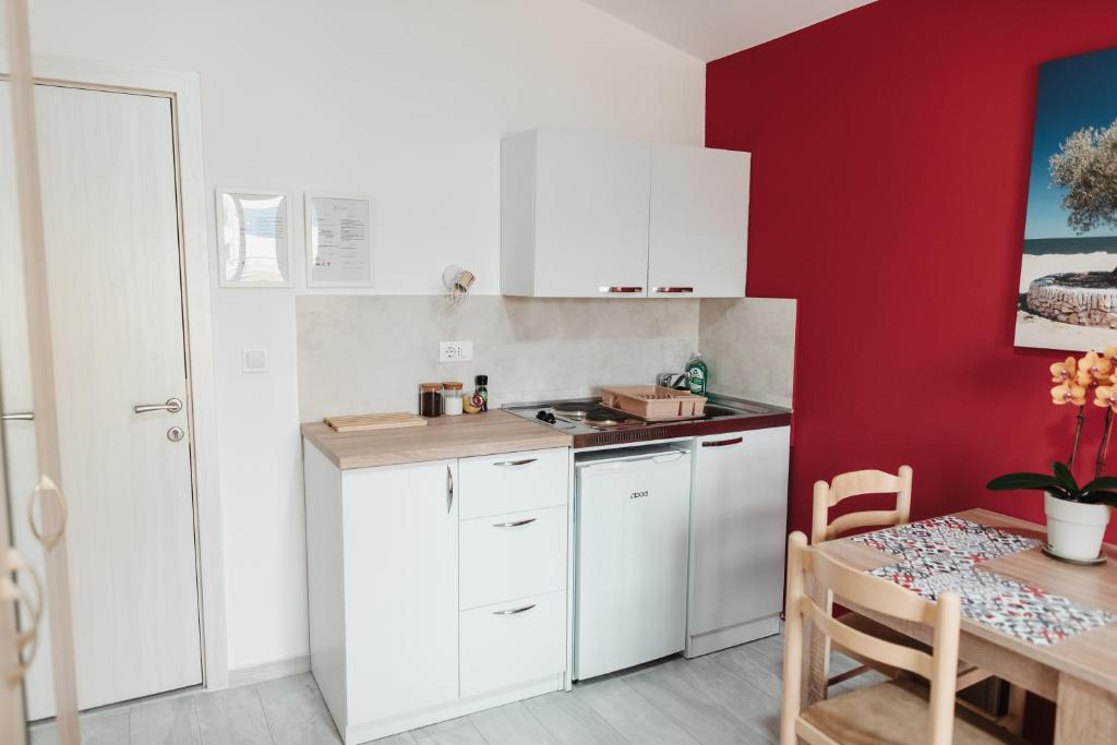 Kuchyň nebo kuchyňský kout v ubytování Guesthouse Lole