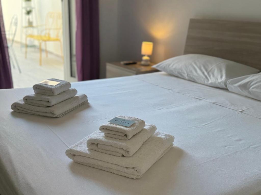 Postel nebo postele na pokoji v ubytování B&B Civico 42