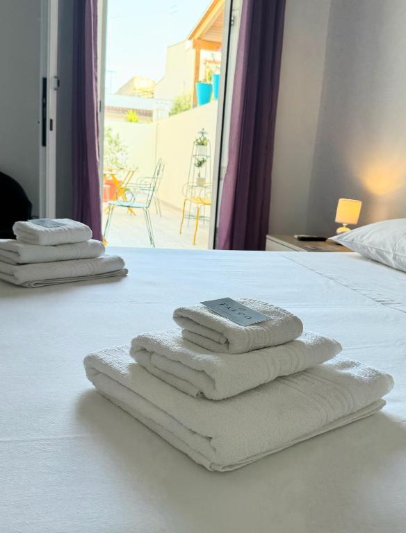 Postel nebo postele na pokoji v ubytování B&B Civico 42