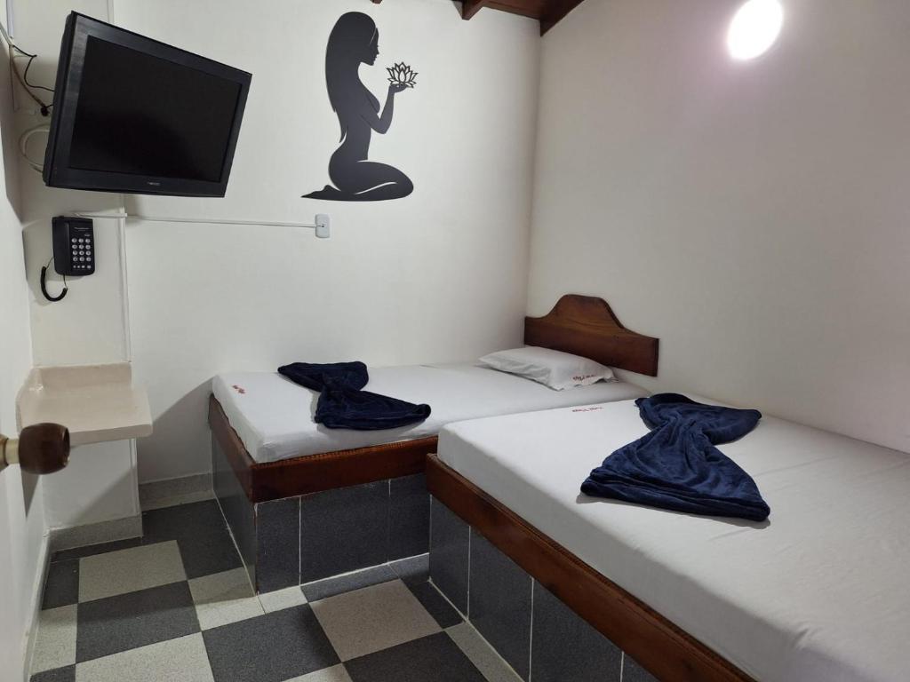 Postel nebo postele na pokoji v ubytování Hotel Playa Sur
