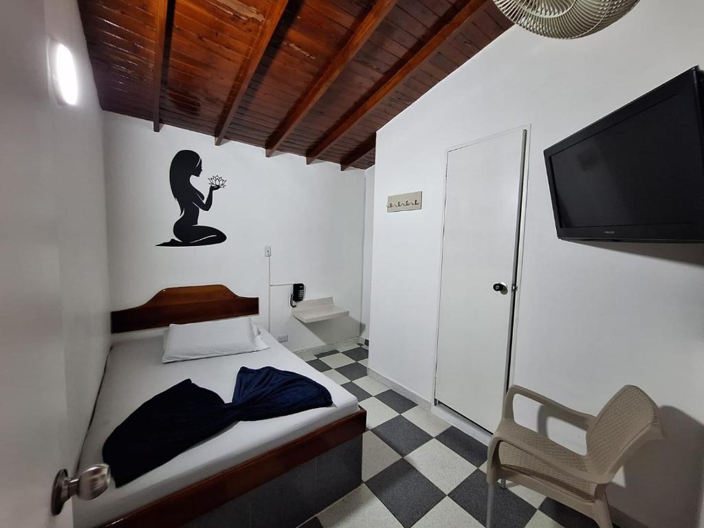 Postel nebo postele na pokoji v ubytování Hotel Playa Sur