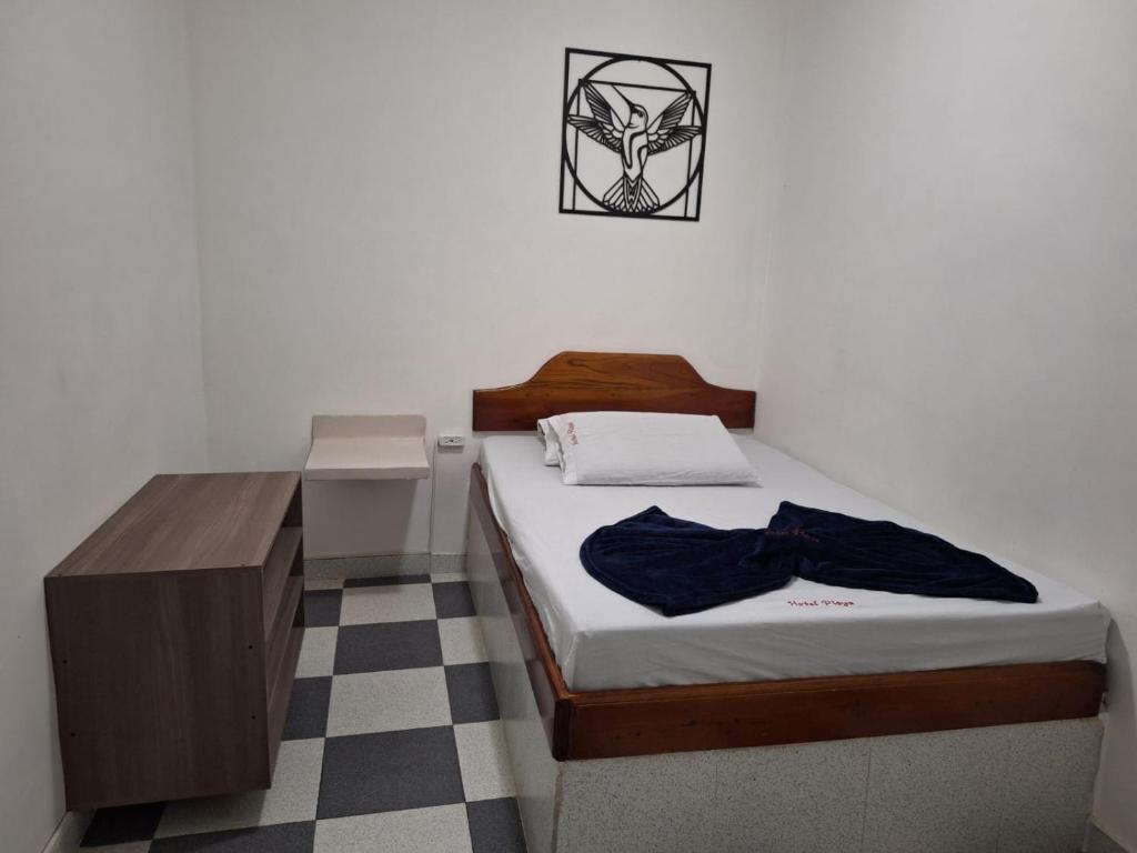 Postel nebo postele na pokoji v ubytování Hotel Playa Sur
