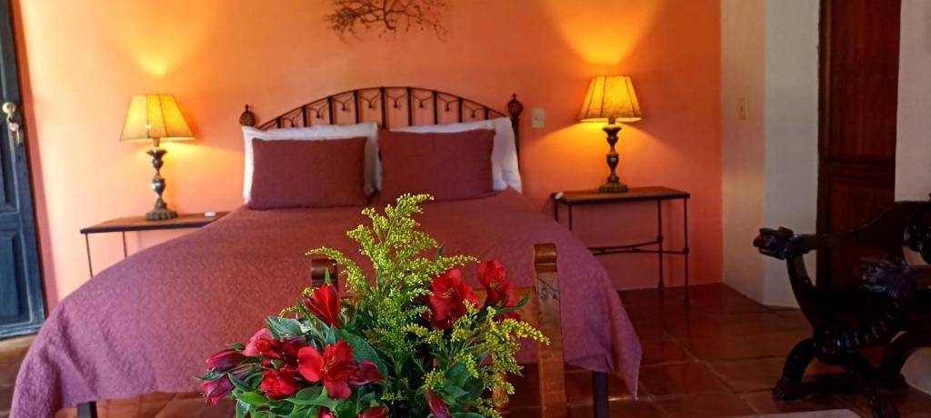 Postel nebo postele na pokoji v ubytování Hotel Secreto