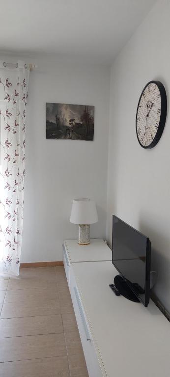 TV a/nebo společenská místnost v ubytování Comodo a tutti servizi