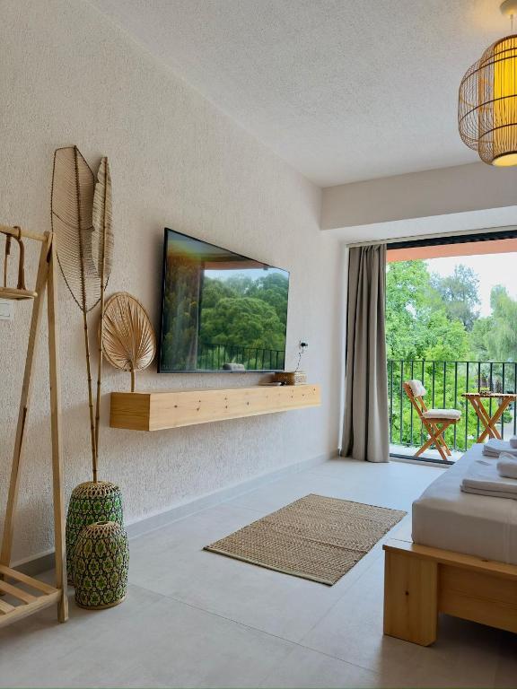 TV a/nebo společenská místnost v ubytování Rue Rooms