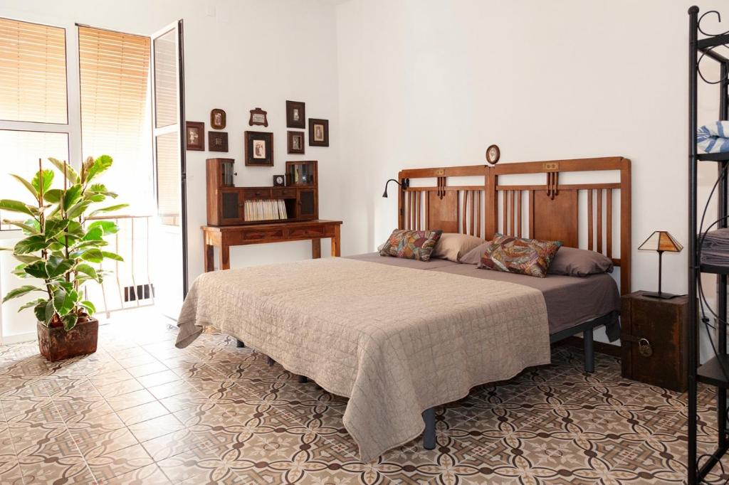 Ένα ή περισσότερα κρεβάτια σε δωμάτιο στο Apartamento a 400m de la playa, Puerto de Sagunto