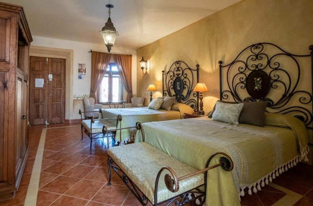 Postel nebo postele na pokoji v ubytování Centenario Los Arroyitos