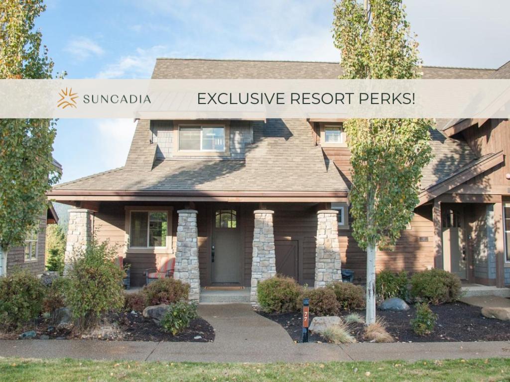 a house with a sign that reads exclusive resort perominium at Great Location Near Pool with Suncadia Pool Access in Cle Elum