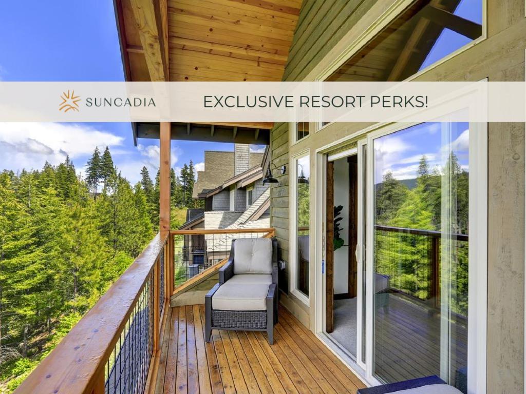 a screened porch with a chair on a deck at Great Location Near Pool with Suncadia Pool Access in Cle Elum