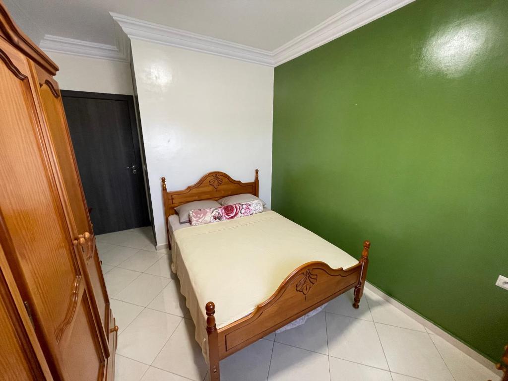 Postel nebo postele na pokoji v ubytování Martil apartment Fadaat Asaada
