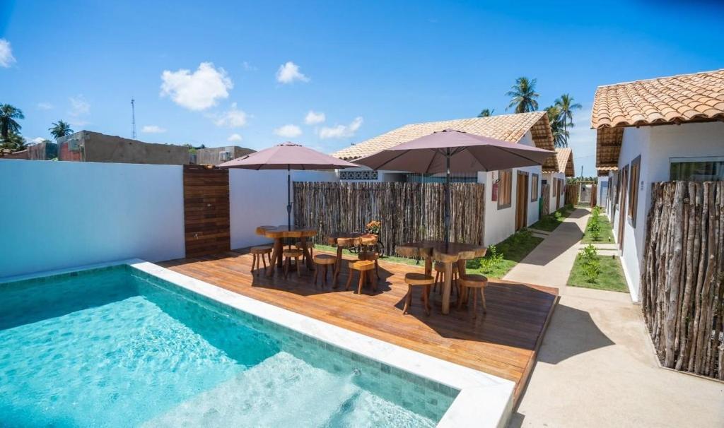 Bazén v ubytování Villa Nahum - Chalés - São Miguel dos Milagres nebo v jeho okolí