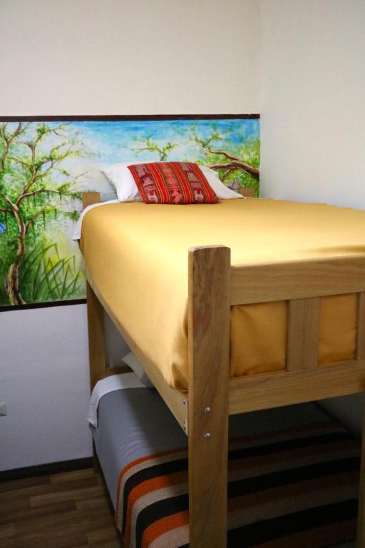 Postel nebo postele na pokoji v ubytování Millas House Cusco