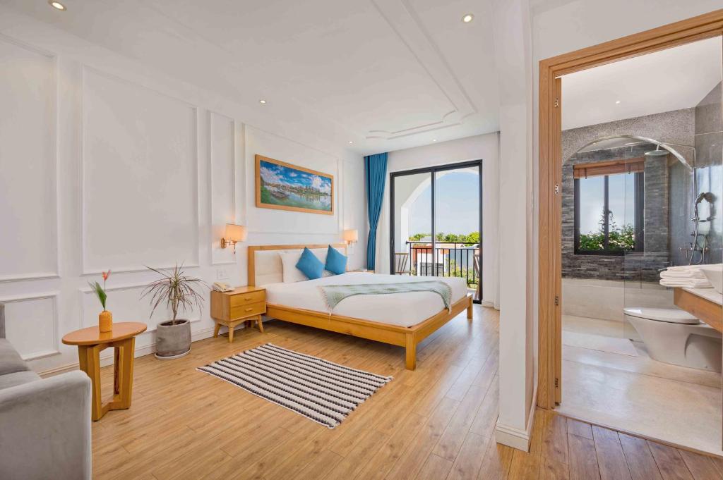 Postel nebo postele na pokoji v ubytování Lime Villa Hoi An