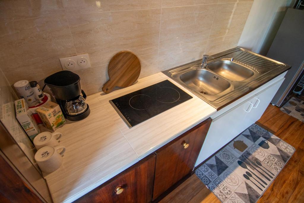Kuchyň nebo kuchyňský kout v ubytování Bora Bora bungalow
