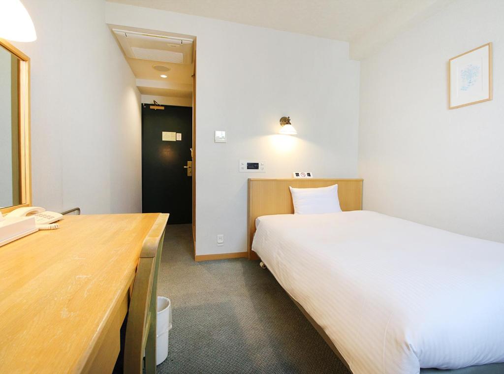 Postel nebo postele na pokoji v ubytování Island Hotel