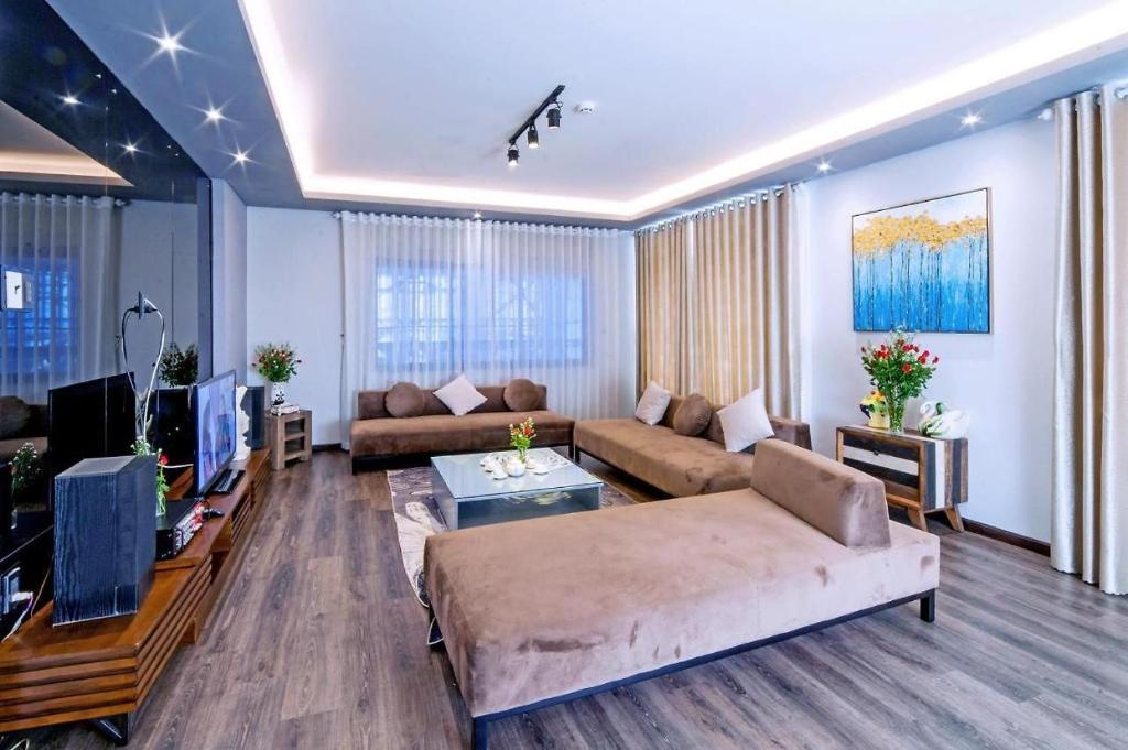 Χώρος καθιστικού στο Thu Trang Hotel VT - by BAY LUXURY