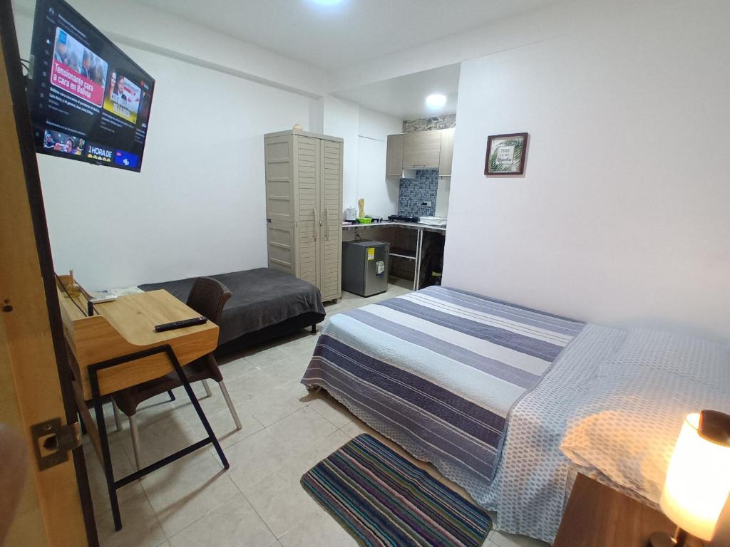 Ένα ή περισσότερα κρεβάτια σε δωμάτιο στο Habitación confortable y central a 100mts de la playa