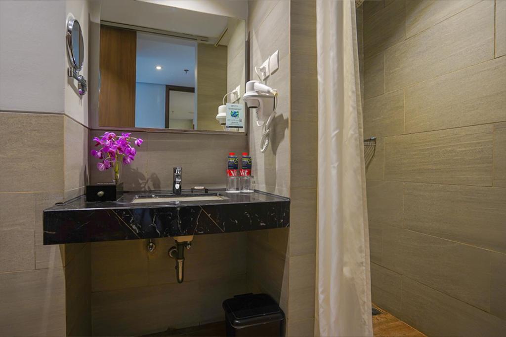 Koupelna v ubytování BATIQA Hotel Palembang