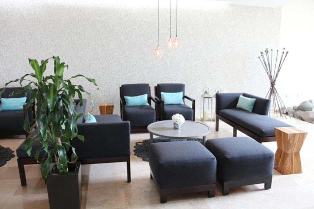 Posezení v ubytování Rivoli Select Hotel