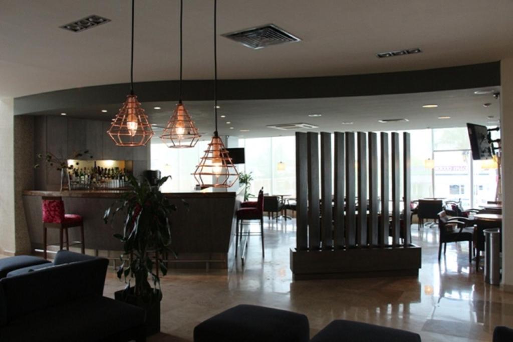 Posezení v ubytování Rivoli Select Hotel