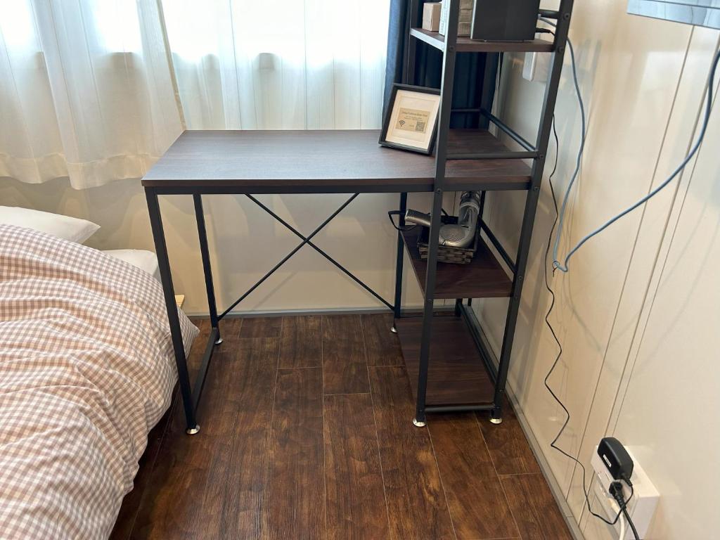 Postel nebo postele na pokoji v ubytování Daigo Kujigawa Base Hotel