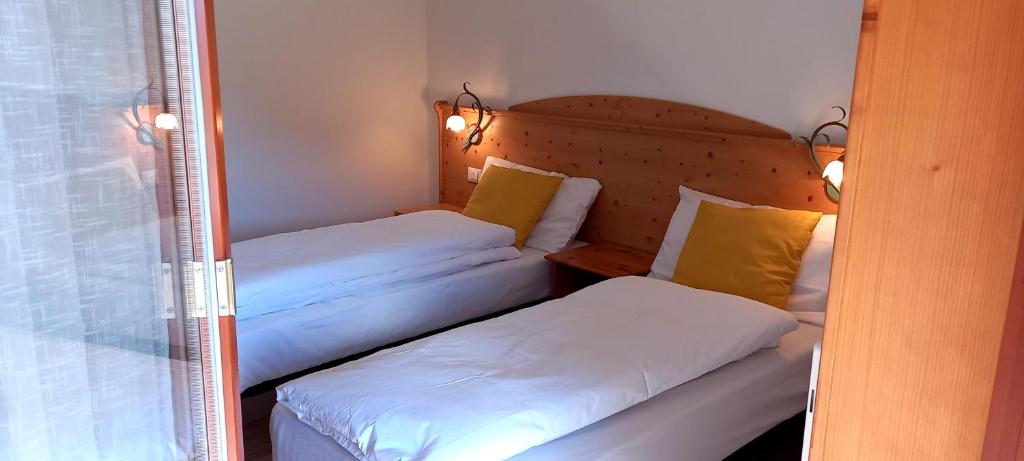 Postel nebo postele na pokoji v ubytování Locanda Val Canali