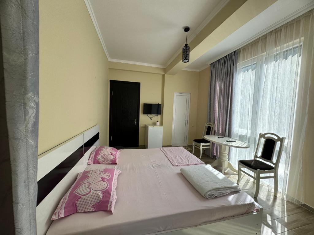Postel nebo postele na pokoji v ubytování Royal House