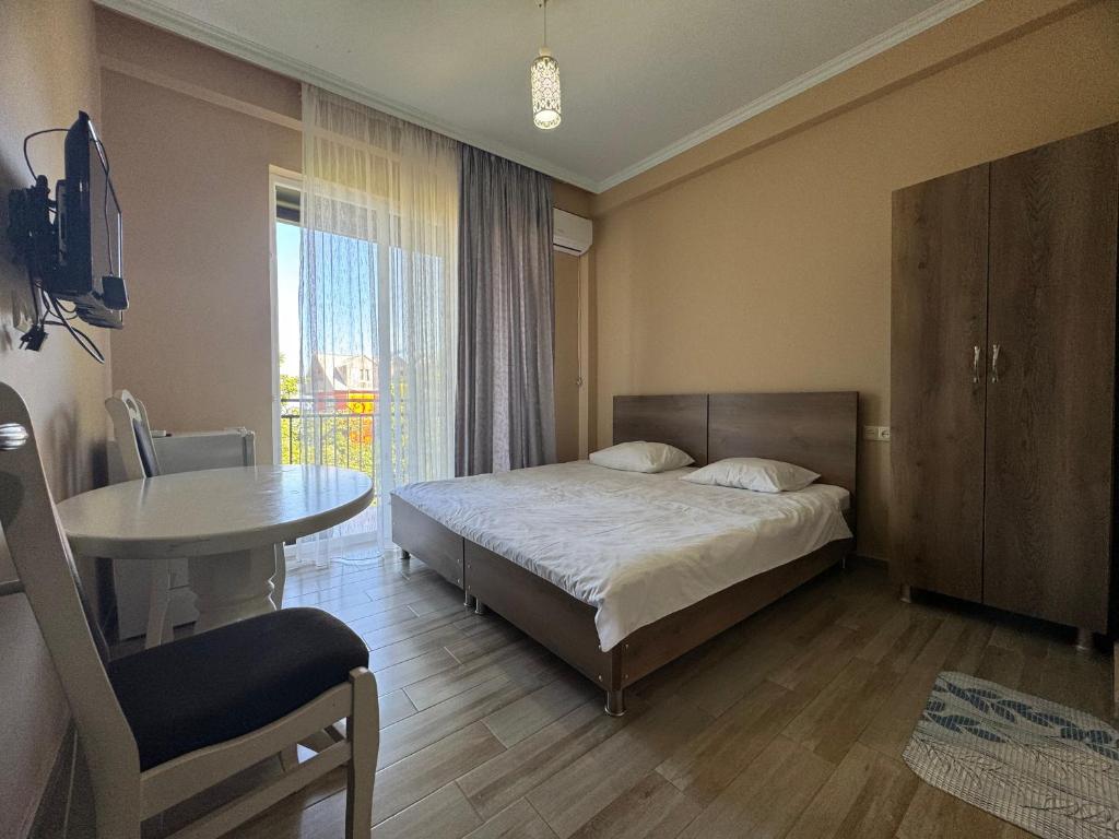 Postel nebo postele na pokoji v ubytování Royal House