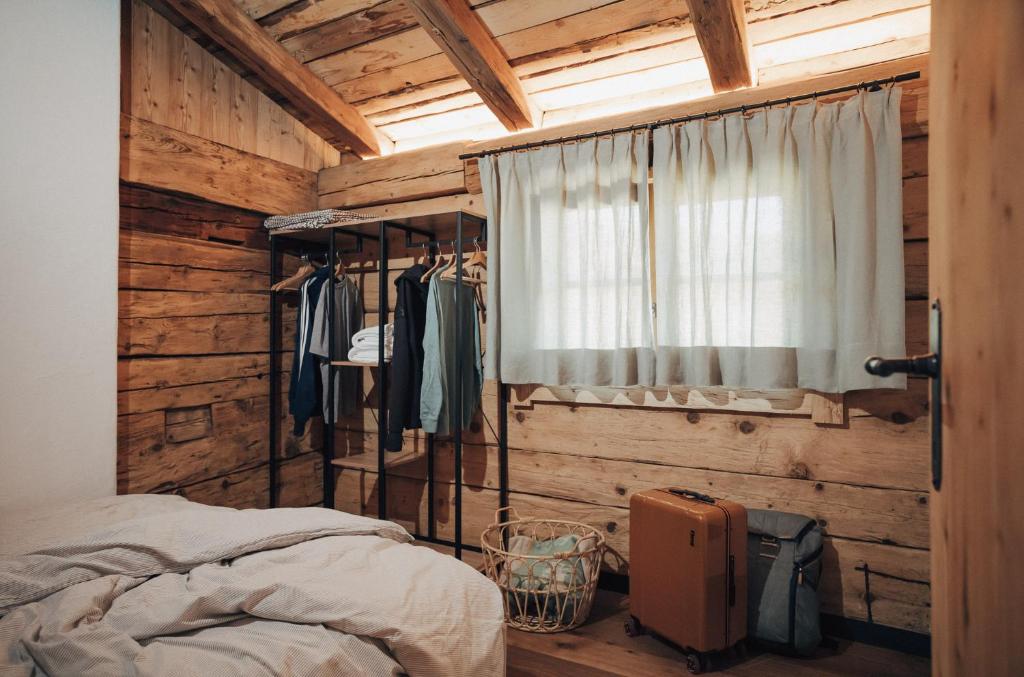 Posteľ alebo postele v izbe v ubytovaní L.A. MOUNTAIN LODGE