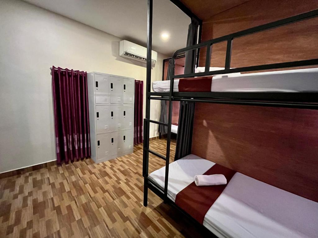Postel nebo postele na pokoji v ubytování Gecko Hostel