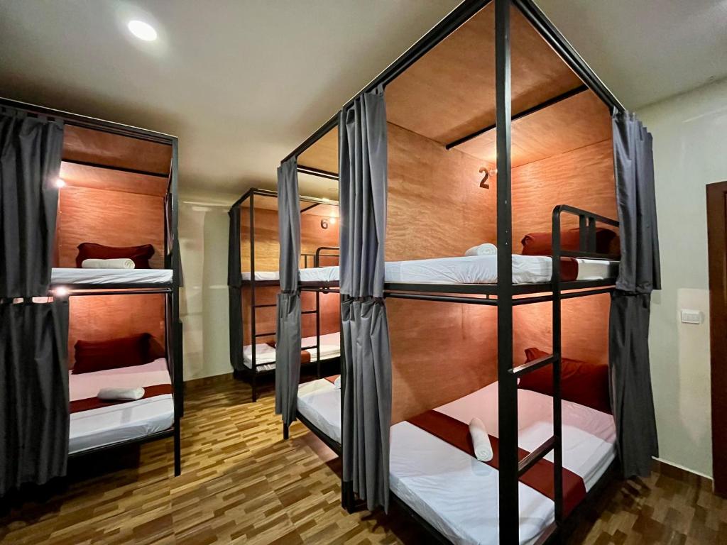 Postel nebo postele na pokoji v ubytování Gecko Hostel