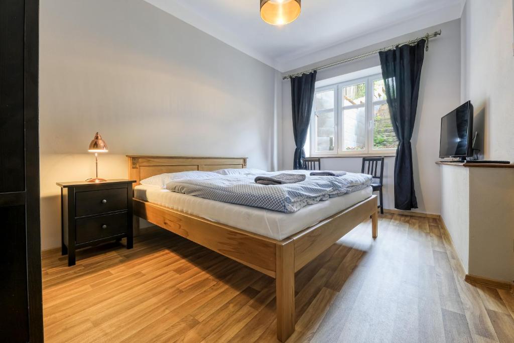 Postel nebo postele na pokoji v ubytování Vila František